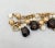Vintage 1960s Signed Napier Goldtone Faux-Topaz & Mother of Pearl Charm Bracelet For Sale - Image 14 of 14