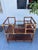 A beautifully crafted vintage bar cart from Georgian Furnishing Company featuring rich wood tones, intricate parquet...
