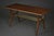 A rare rockabilly coffee table from the 1960s, distinguished by its dynamic form and elegant proportions. The table...