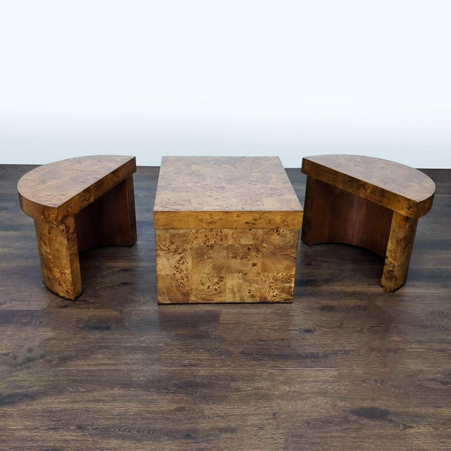 This unique Frontgate coffee table set features a beautiful burl wood finish and a versatile modular design. The oval...