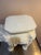 1960s-70s white plaster elephant garden stool, plant stand or side table. Some minor discoloration marks near top head...