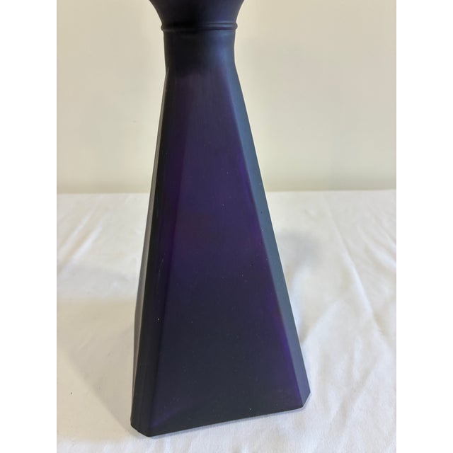 Bold vintage amethyst glass decanter from Mexico. Tall geometric form with a tapered body and original stopper. The rich...