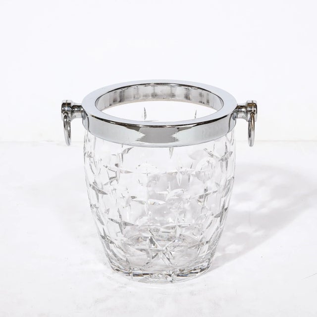 This bold and glamorous Mid-Century Modernist Cut Crystal Ice Bucket Originates from France, Circa 1950. Featuring a rim...