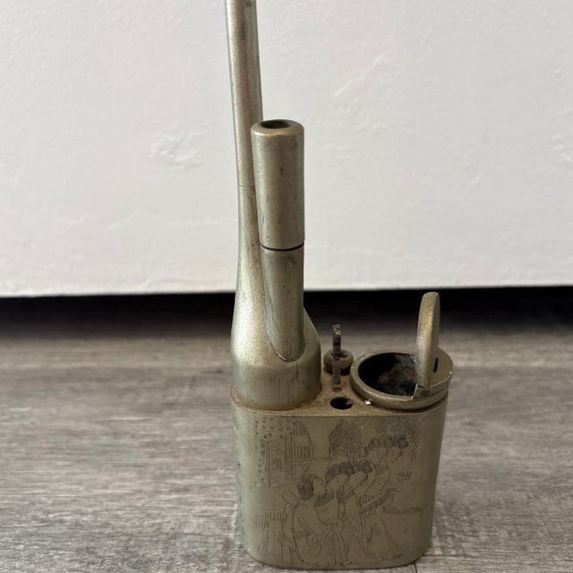 Antique Chinese Brass Water Pipe, circa 1920s (Republic of China period), measuring approximately 13.5 inches tall. This...