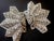 Art deco, 1930s starburst or sunburst chevron clip mates by Polcini. Marked with a small 5-pointed star stamped directly...