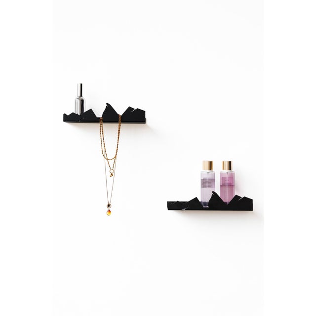 EMKO team in collaboration with Etienne Blondel created decorative floating shelf NVMD. Name reflects the idea of...