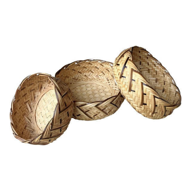 Late 20th-Century Artfully Handwoven Trio of Nested Rattan Circular Baskets For Sale