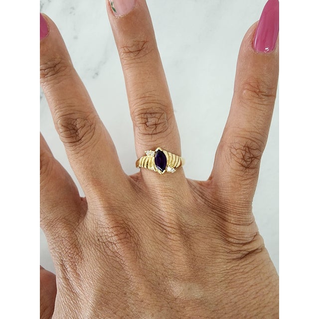 ♥ Product Summary ♥ Main Stone: Amethyst Band Material: 14k Yellow Gold Stone Cut: Marquise/Round Width: 10MM Weight: 4 grams