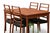 Teak dining table designed by Brdr. Furbo Spottrup in Denmark. The dining table has sturdy extendable leaves that are...