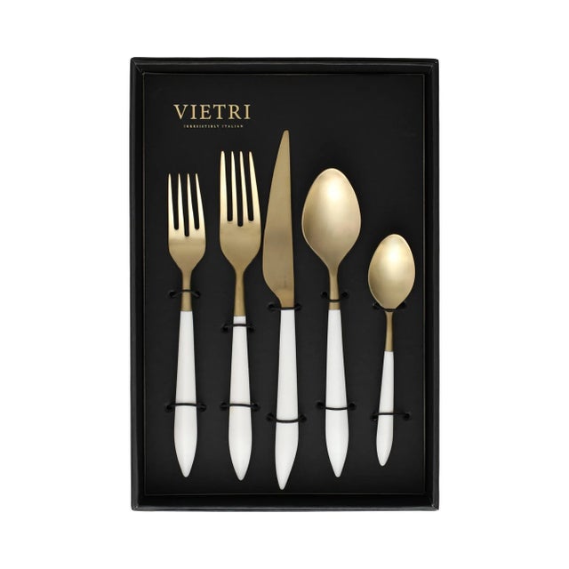 The contemporary matte handle found on the Ares Oro White Five-Piece Place Setting (Set of 4) provides perfect balance and...