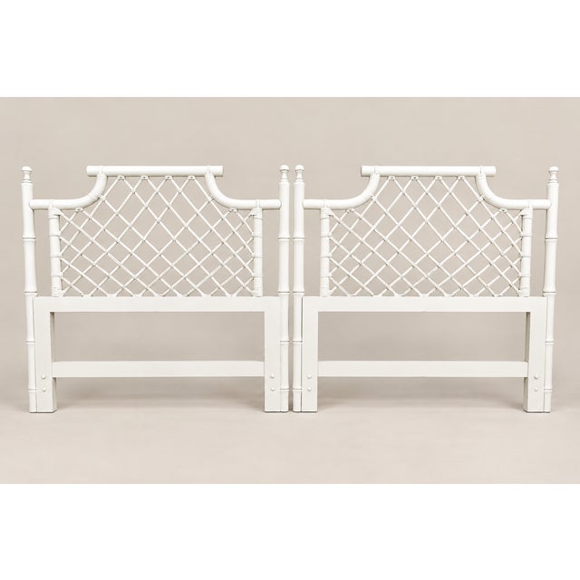 Offered is a pair of rare iconic Pagoda top lattice Ficks Reed twin headboards. They were acquired from an estate on the...