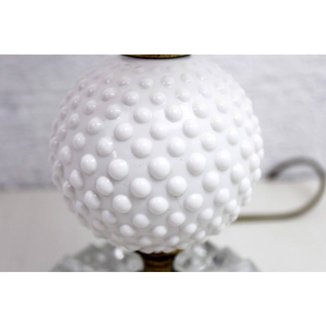 Table lamp from the 50s Entirely made of glass and brass, it exudes incredible charm. This all-glass base is truly...