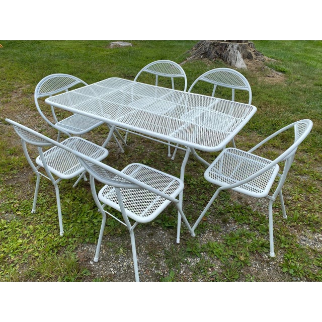 This is a very hard to find set of mid-century folding dining table and 6 hoop back chairs made by Rid-Jid and often...