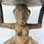 The Tabwa Figural Stool, originating from the Democratic Republic of Congo, stands as a striking example of the Tabwa...