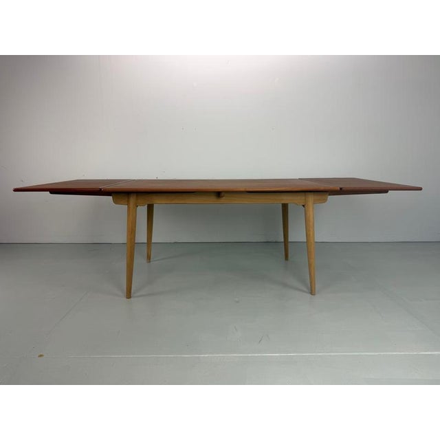 Scandinavian modern period dining table designed by hans j. Wegner and manufactured for andreas tuck in 1950s period,...