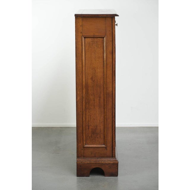 This antique English oak bookcase/inlay cabinet from the mid-19th century. : This antique English oak bookcase/inlay...