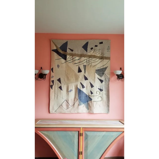 "Triangle V", a hand woven tapestry, designed as an abstract art tapestry and hand woven by Myra Reichel is a 4' x 5' x...