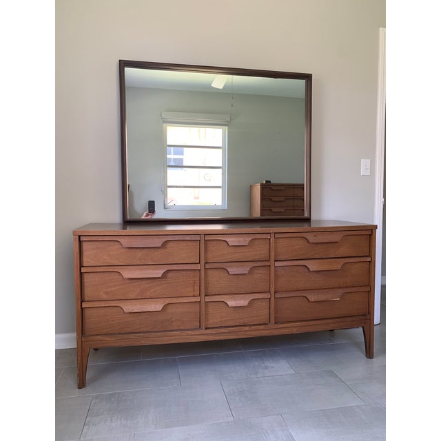 This gorgeous 9 drawer dresser is not only beautiful but offers great storage. Attributed to Johnson Carper for Fashion...