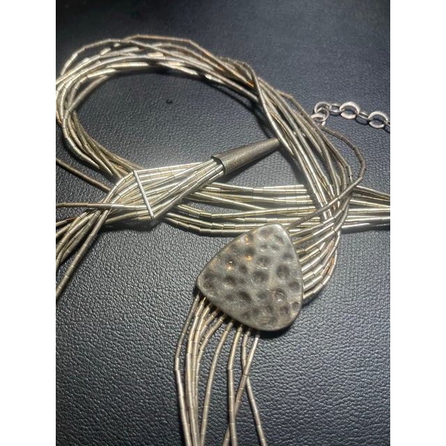 Liquid silver jewelry originated with Native American artisans in the southwestern United States during the 1970s. The...