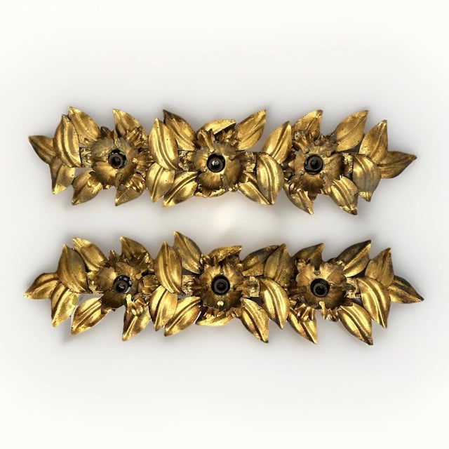 Pair 1960's Hollywood Regency Gilt Metal Floral Form 3 Light Wall Sconces. Stunning designer lighting which can be mounted...