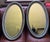 Large 1978 Brock-McVey oval mirror set. 35Hx19.5W Distressed pewter composite finished frames, no chips, scratches or cracks.