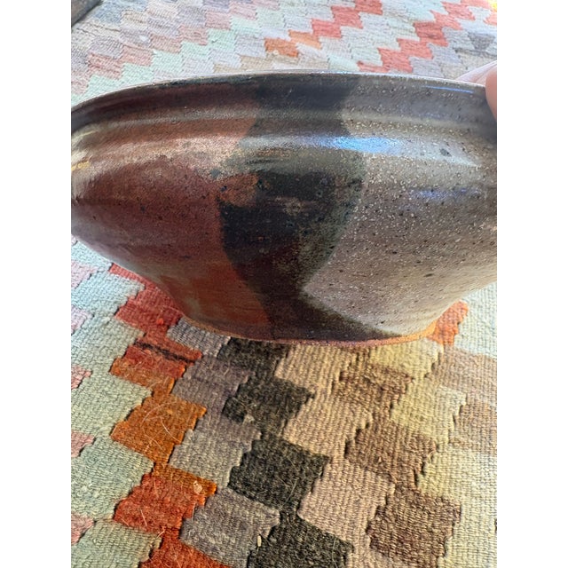 Handmade studio pottery serving bowl signed by ceramic artist Ann Campbell, measuring approximately 9.5-10 inches in...