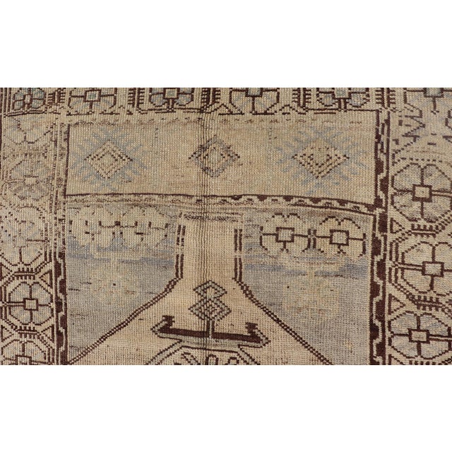Textile Mid 20th Century Geometric Tribal Vintage Turkish Oushak Rug in Brown Cream Light Blue and Tan For Sale - Image 7 of 13