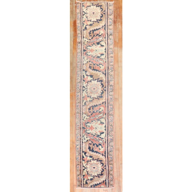 A Persian Mahal fragment Border runner from the late 19th century. Measures: 1'9'' x 8'6'' Mahal Persian carpets from the...