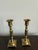 A refined pair of vintage Japanese brass candlesticks showcasing clean architectural lines and understated elegance....