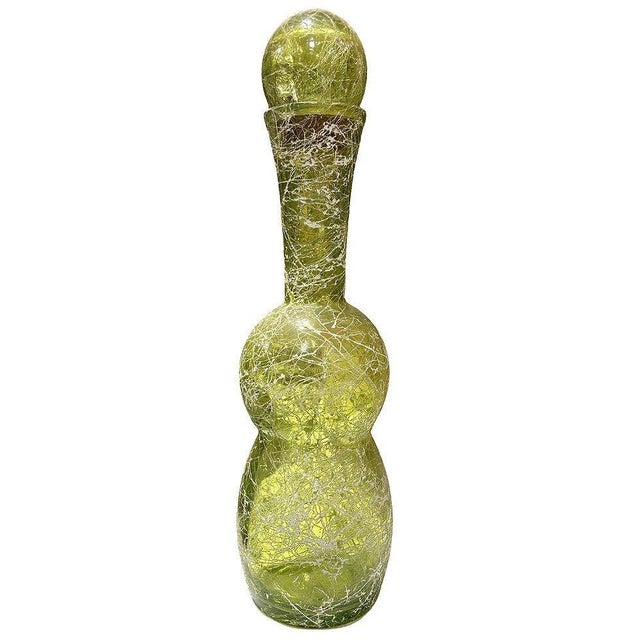 Stylish Mid-Century Modern Mod style green spaghetti string glass decanter featuring intricate textured detailing and a...