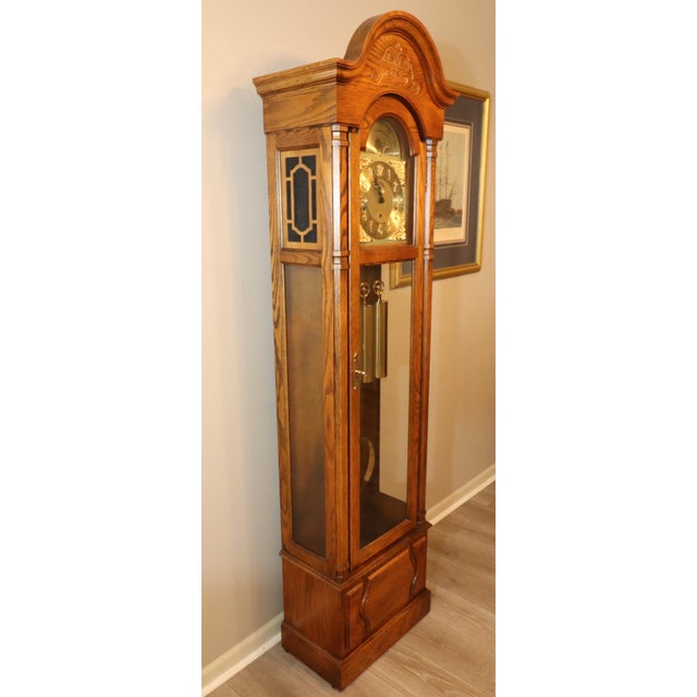 An impressive Howard Miller “Beaumont” grandfather clock, model 610-259, produced in Zeeland, Michigan, during the...