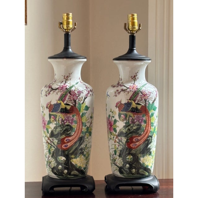 Offering a beautiful set of Chinese porcelain table lamps from the mid-20th century. These tall, elegant, vase-form lamps...