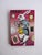 This mixed-media collage features a whimsical rabbit dressed in a dapper outfit, surrounded by an array of clocks that...