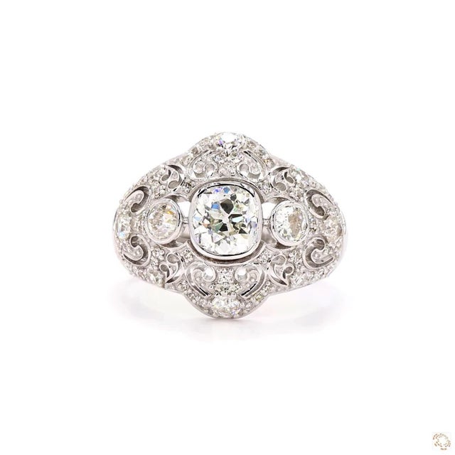 This cocktail ring, an early-twentieth-century antique design, centers on a 2.05-carat diamond in a round brilliant cut...