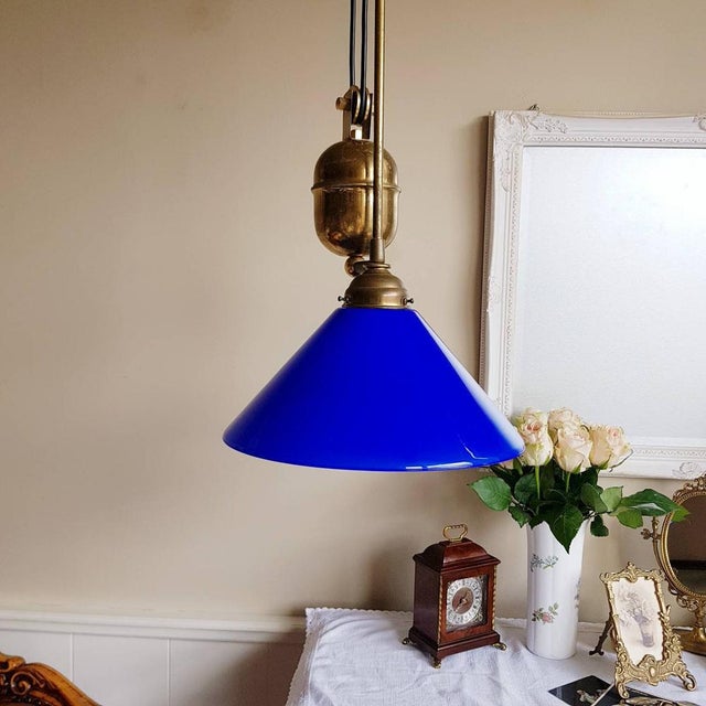 Pendant lamp from the ’60s. Vintage Blue Opaline lampshade with counterweight pendant lamp. Art Deco style. The lamp...