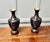 A Pair of Black Cloisonné Baluster Vases on stands A very unusual pair of French cloisonné baluster vases, the vases are...