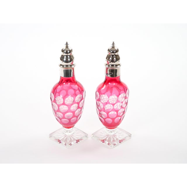An elegant pair of mid-century modern Val Saint Lambert decorative glass bottles, made in Belgium during the mid-to-late...