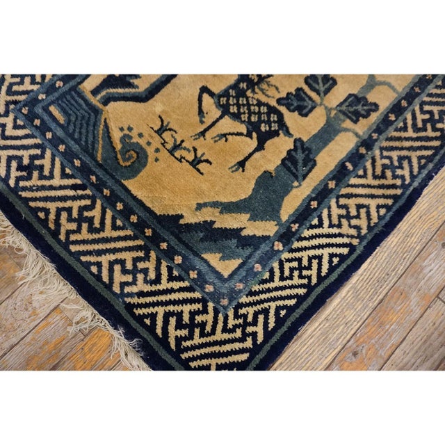 Antique Chinese - Baotou Small Scatter Size Wool Ivory Rug, Circa Date: 1920s. This exquisite Baotou piece represents the...