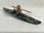 This exceptional vintage hand-carved soapstone sculpture depicts a traditional Alaskan Inuit hunter piloting a kayak....