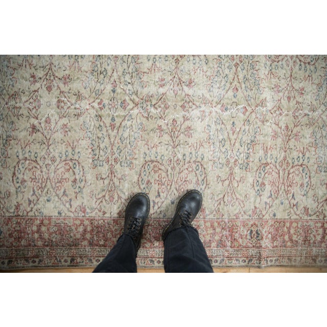 :: Covered field in scrolling vines, minor blossoms, and interconnected vinery, with main border in a thousand flower...