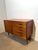 Beautiful vintage mid-century modern sideboard in warm teak veneer, featuring a clean architectural design with elegant...