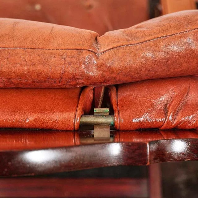 Armchair Dèco in leather and mahogany, length: 84 width: 63 Depth: 105 Seat Height: 35 This piece is attributed to the...