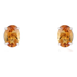 Classic Four Prong 1.49 TCW Oval Citrine Solitaire Stud Earrings in Sterling Silver - A Pair For Sale