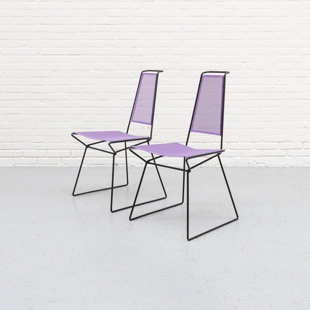 Metal dining chair designed by Rolf Rahmlow in the 1980s. A postmodern design featuring perforated metal and a purple...