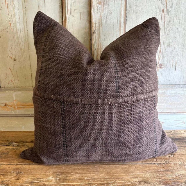 Wool Alpaca accent pillow from. A beautiful rich coco brown and dark brown dot stripe pillow. Large wood yarns woven to...