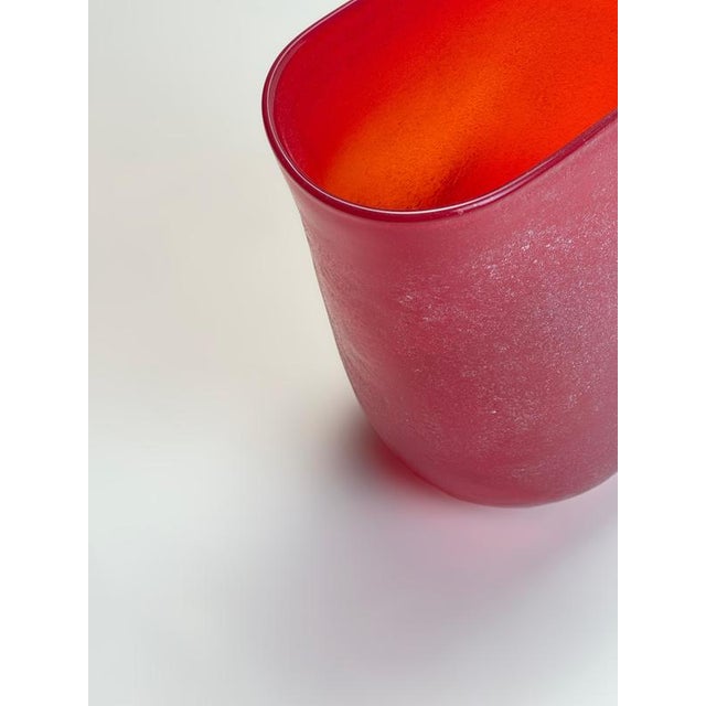 Handblown in Italy in the 1990s, this studio glass vase is formed in a free organic shape, manipulated during the hot-...