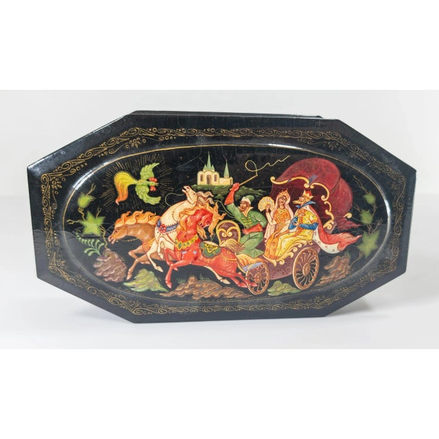 We are selling this vintage Russian lacquer box with Palekh school scene of fairytale story of Golden Rooster. The piece...