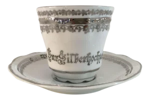 Silver & White German Porcelain Tea Cup