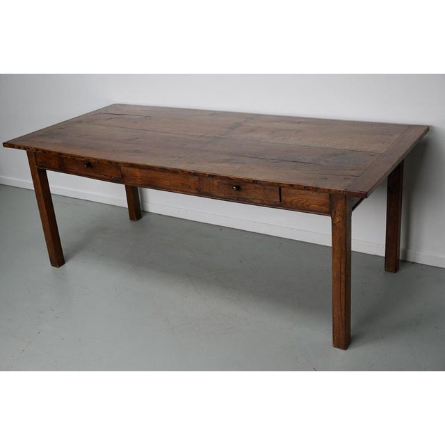 This French farmhouse table was made in the late 19th century in France. It retained a very nice rich patina over the...