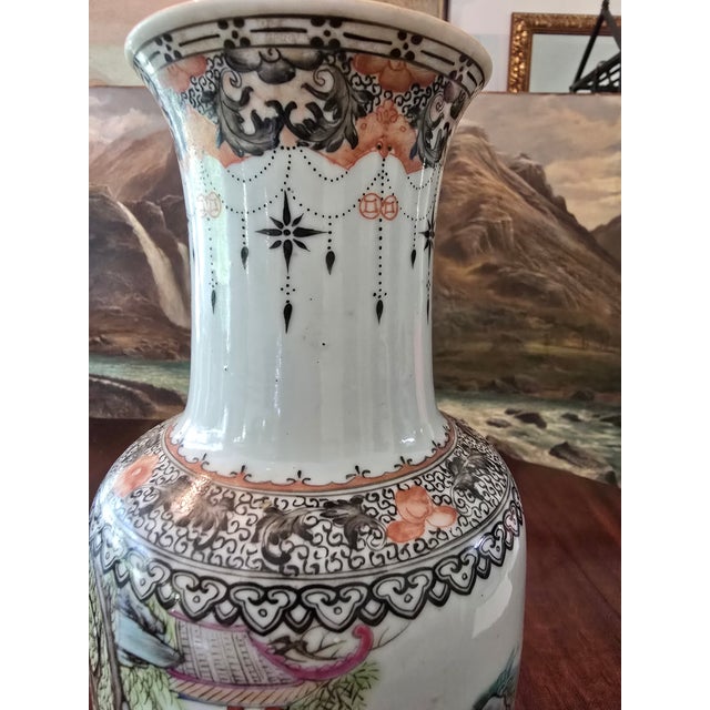 A double stamped antique chinese porcelain vase ( guaranteed over 75 years old chinese handpainted with authentic rouge...